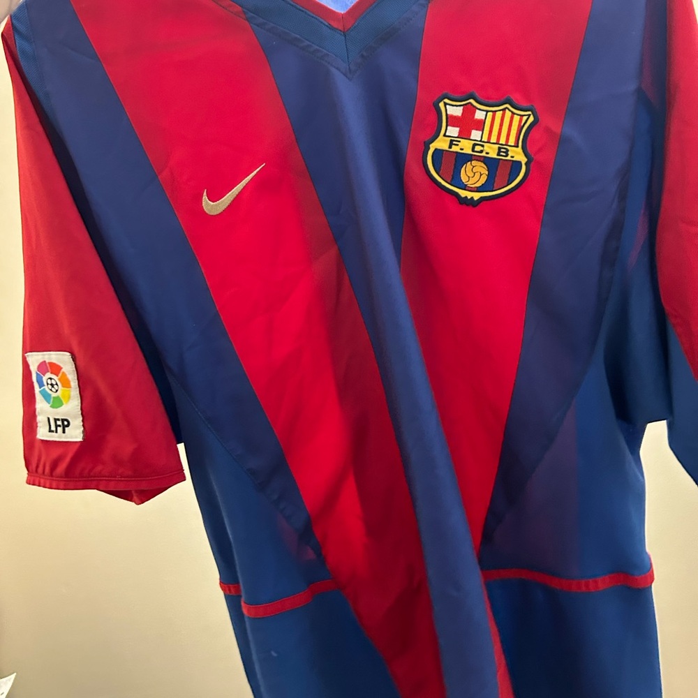 Barcelona jersey in a size large.